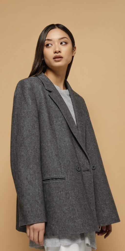 Girl wearing tailored blazer that looks classy and elegant and it always looks timeless.